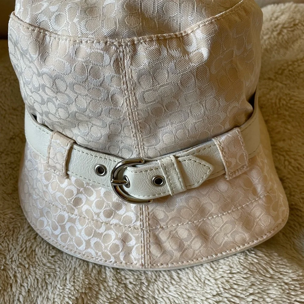 Coach cream color hat with white leather metal buckle belt. Size PS. - Picture 2 of 15